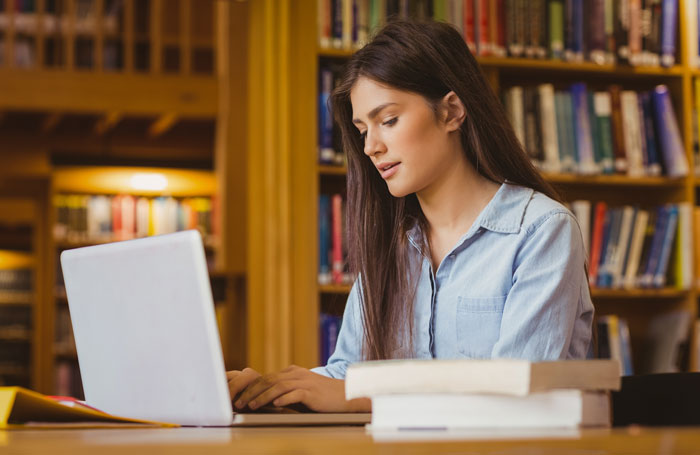 woman on her laptop doing research