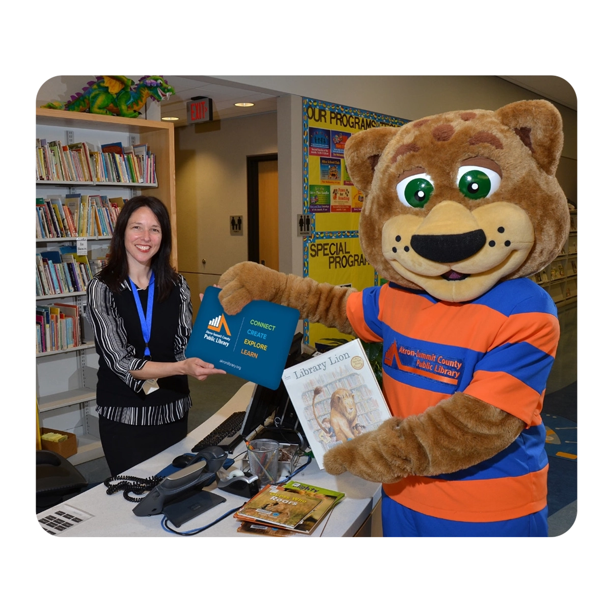 Librarian with PAWS at the library