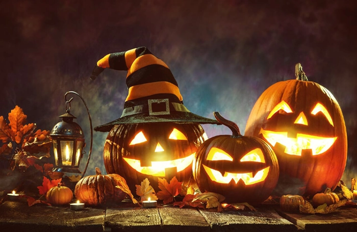 photograph of several carved pumpkins